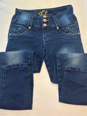 Dark Blue High-Rise Stretch Jeans with sparkly buttons